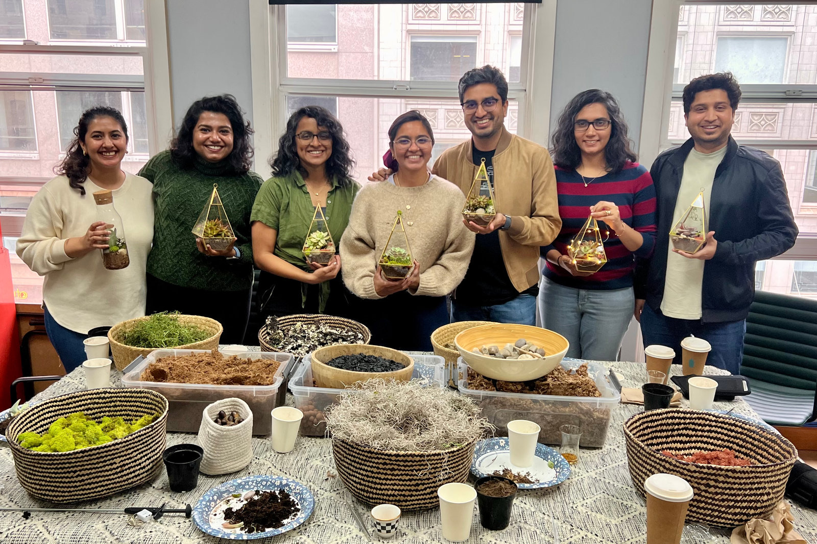 A team with the terrariums they made (KraftStories)
